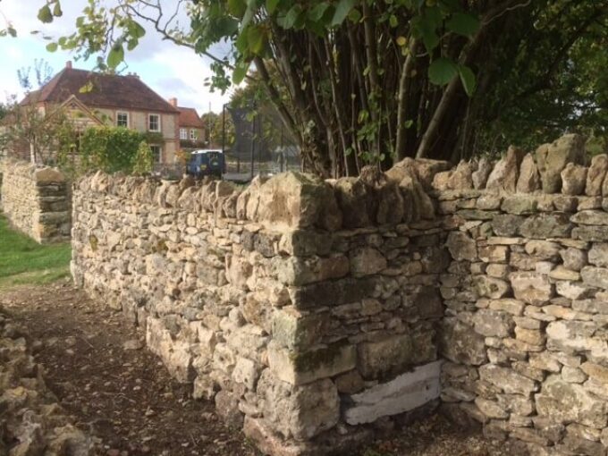Detail of restored Coralline limestone ragstone dry wall
